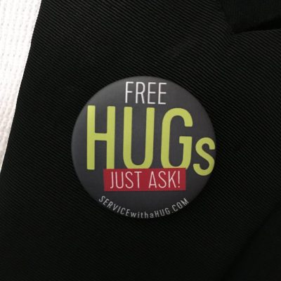 Service with a HUG Lapel badge